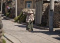 Old woman in andes town village Achoma wearing traditional indigenous handwoven colorful dress costume Colca Canyon Peru Royalty Free Stock Photo