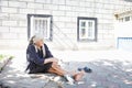 Old woman at backyard Royalty Free Stock Photo
