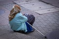 Old woman begging on the street Royalty Free Stock Photo