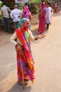 Old woman begging in the street of Fatehpur Sikri, Uttar Pradesh, India
