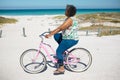Old woman with a bike at the beach Royalty Free Stock Photo