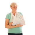 Old woman with broken wrist in gypsum Royalty Free Stock Photo