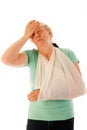 Old woman with broken wrist in gypsum Royalty Free Stock Photo