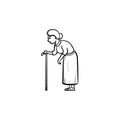 An old woman with cane hand drawn outline doodle icon.