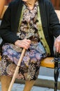 Old woman with a cane