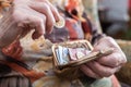 Old woman counting her money Royalty Free Stock Photo