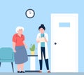 Old woman at doctor. Nurse or young clinic worker and senior patient. Nursing home or hospital, ambulance. Healthcare Royalty Free Stock Photo