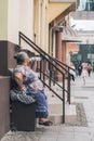 Old woman drinking water