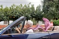 Old woman driving a convertible Royalty Free Stock Photo
