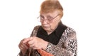 The old woman is engaged in knittin Royalty Free Stock Photo