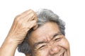 Old woman felt a lot of anxiety about hair loss and itching dandruff issue Royalty Free Stock Photo