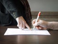 An old woman is forced to write a will for an apartment Royalty Free Stock Photo