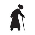 Old woman going with walking stick silhouette icon