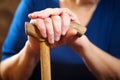 Old woman hands with cane