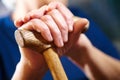 Old woman hands with cane Royalty Free Stock Photo