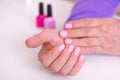 Old woman hands with manicure nails Royalty Free Stock Photo