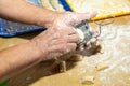 Old woman hands preparing fresh italian pasta gnocchi. Concept Italian Traditional cuisine Royalty Free Stock Photo