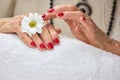 Old woman hands in spa salon. Royalty Free Stock Photo