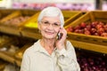 Old woman having a phone call Royalty Free Stock Photo