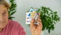 An old woman holds pills in her hands. Selective focus. Royalty Free Stock Photo
