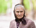 Old woman with kerchief outdoor