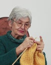 Old woman knitting