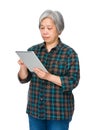 Old woman learn to use tablet