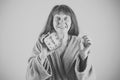 Old woman with long hair hold alarm clock Royalty Free Stock Photo