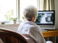 Old woman looking at computer screen at home. AI generated picture