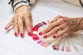 Old woman manicured hands with rings. Royalty Free Stock Photo