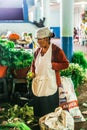 Old Woman in the market of city Puyo in Ecuador