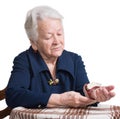 Old woman measures arterial pressure Royalty Free Stock Photo