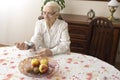 The old woman measures the pressure apparatus wrist. Royalty Free Stock Photo