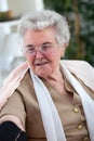 Old woman measuring her blood pressure Royalty Free Stock Photo