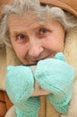 Old woman with mug of hot tea Royalty Free Stock Photo