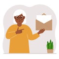 A old woman with an open envelope with a letter. Empty sheet of paper for text template. Mail concept. Sending a message