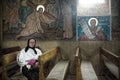 An old woman in a orthodox church Royalty Free Stock Photo