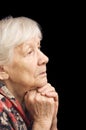 Old woman prays Royalty Free Stock Photo