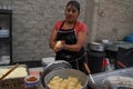 Old woman preparing a typical mexican food