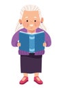 old woman reading book standing Royalty Free Stock Photo