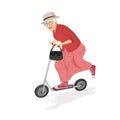 Old woman on the scooter. Old progressive woman. Senior having fun. Old woman enjoying her hobbies.