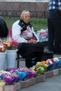 Old woman selling flowers in the street in Kazan,Russia