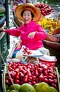 Old woman selling fruit in bangkok floating market Royalty Free Stock Photo