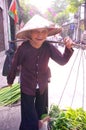 Old woman selling vegetables