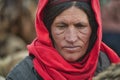 Old woman singer of the Upper Shimshal waiting animals to return from pasture.