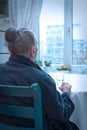 Very old lonely woman window Royalty Free Stock Photo