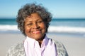 Old woman smiling at the beach Royalty Free Stock Photo