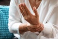 Old woman suffering from wrist hand pain, health problem concept Royalty Free Stock Photo