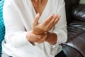 Old woman suffering from wrist hand pain, health problem concept Royalty Free Stock Photo