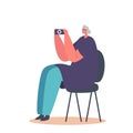 Old Woman Use Mobile Phone. Elderly Lady Sitting on Chair Take Pictures, Communicate in Social Networks Royalty Free Stock Photo